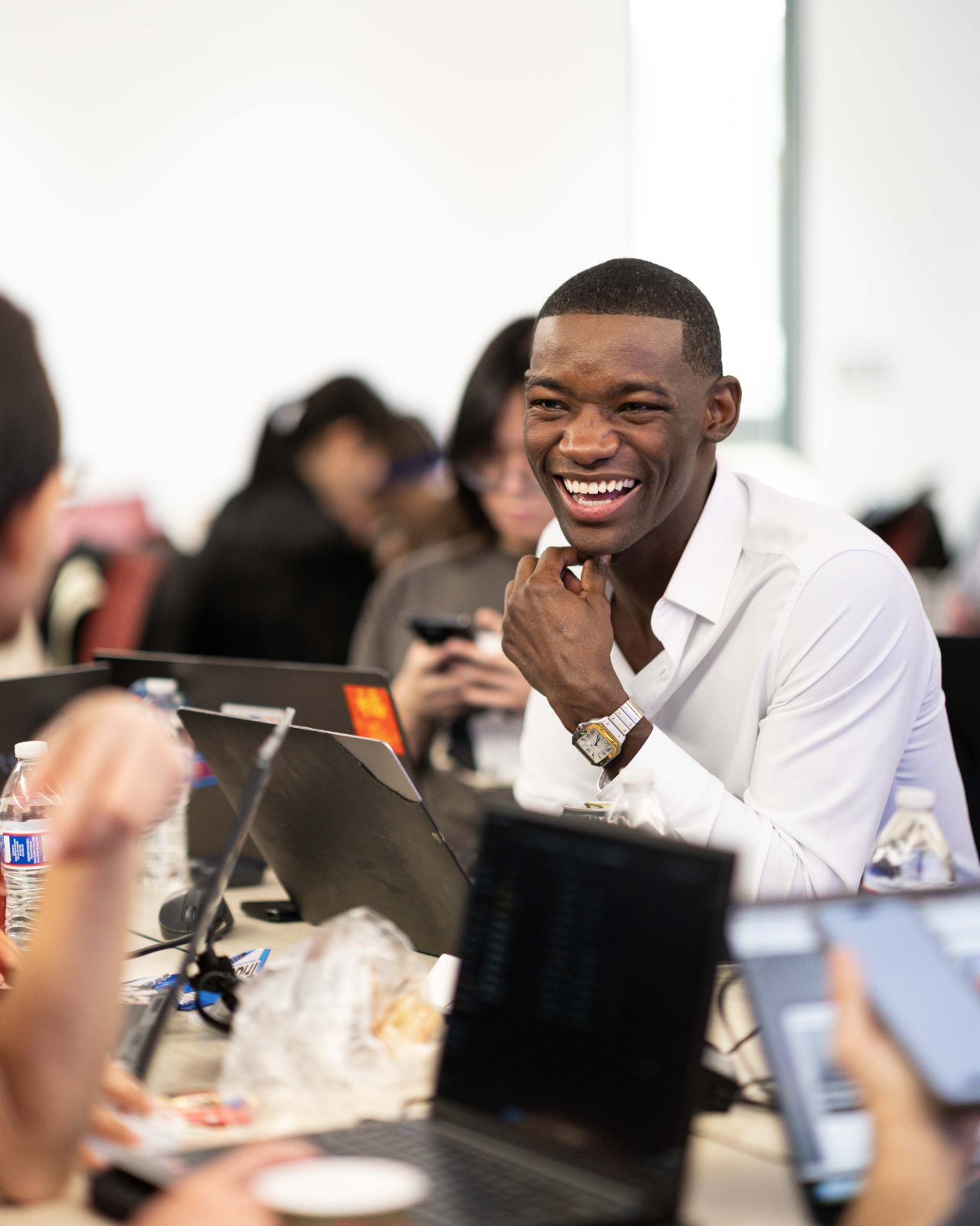 Developers collaborating on code at Hackathon @NYC in New York City by JY Studio