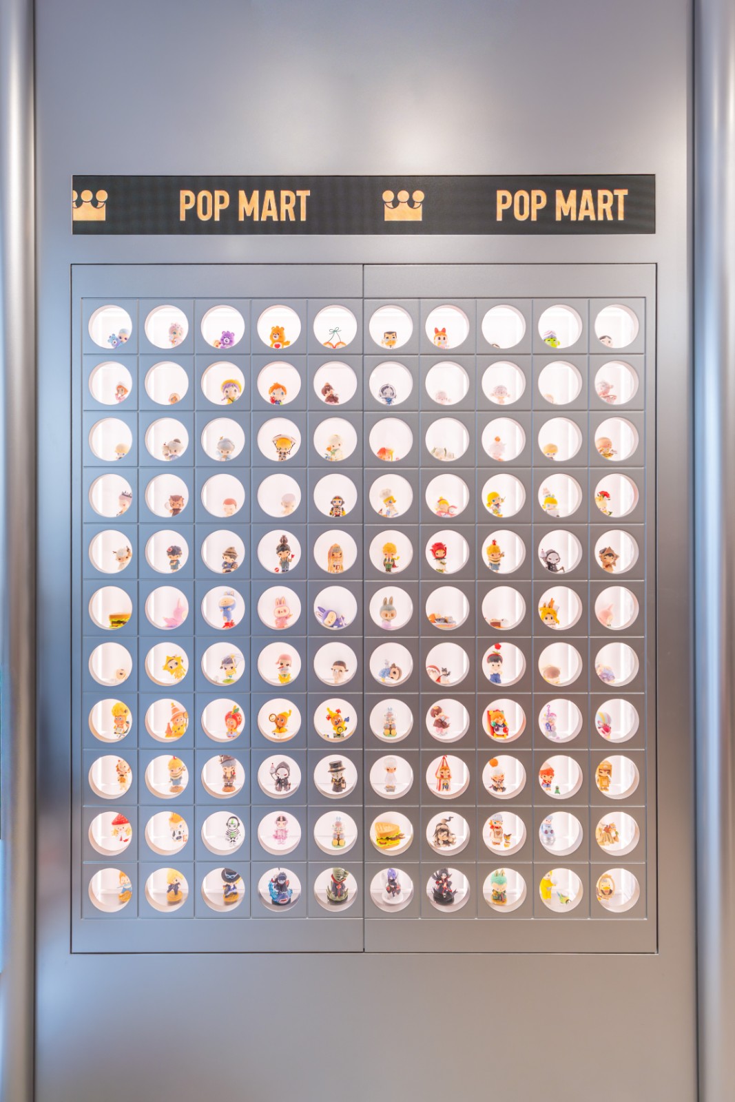 Fans unboxing Pop Mart collectibles at Hillsdale Mall grand opening event in San Mateo by JY Studio