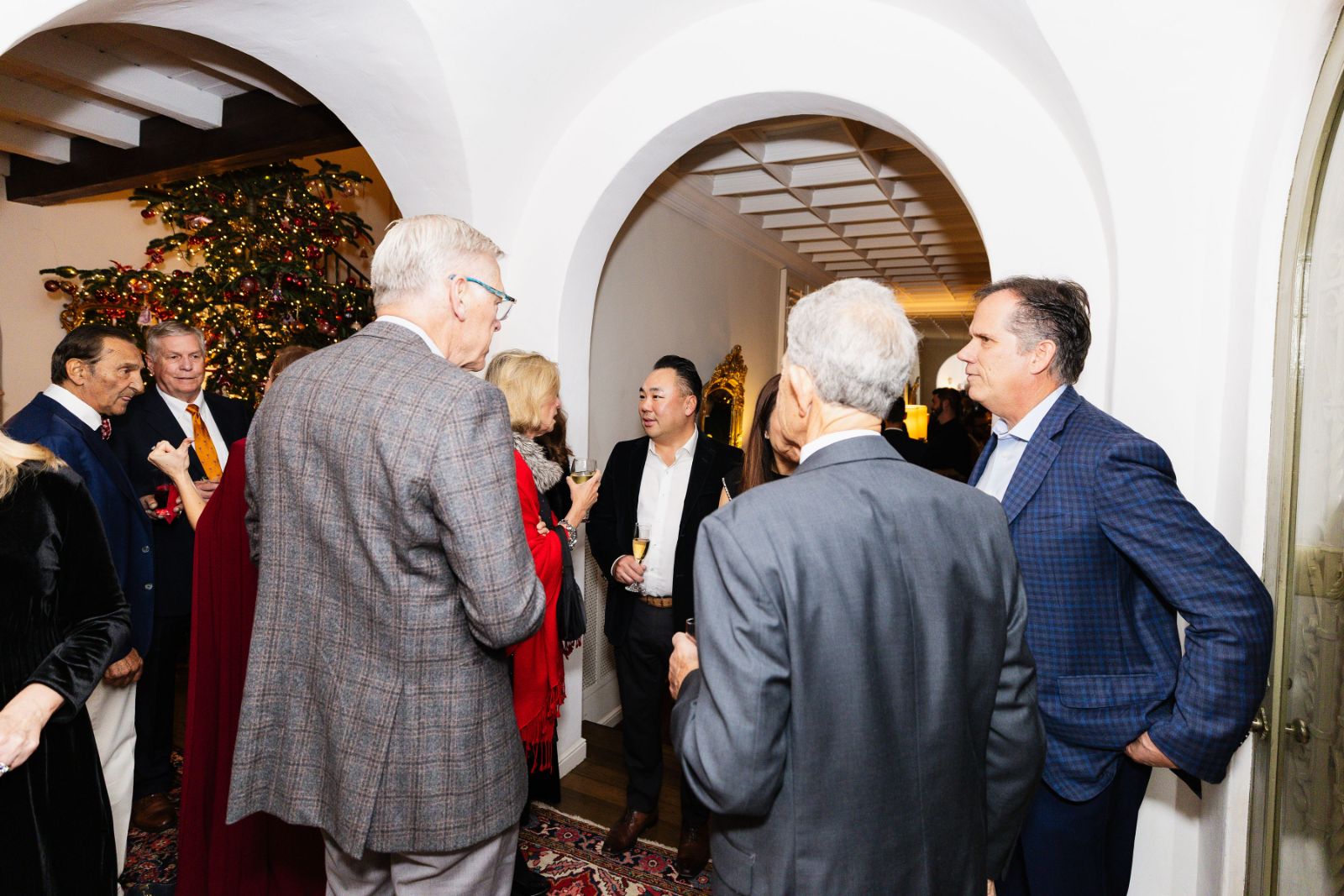 Holiday party atmosphere with festive decorations at a Family Christmas Holiday Party in Oakland by JY Studio