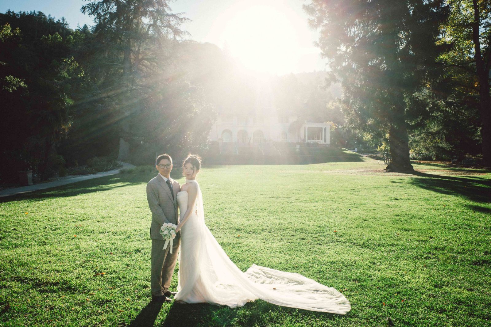 Couple sharing a joyful moment in the garden setting at Montalvo Arts Center by SlowMo Studio