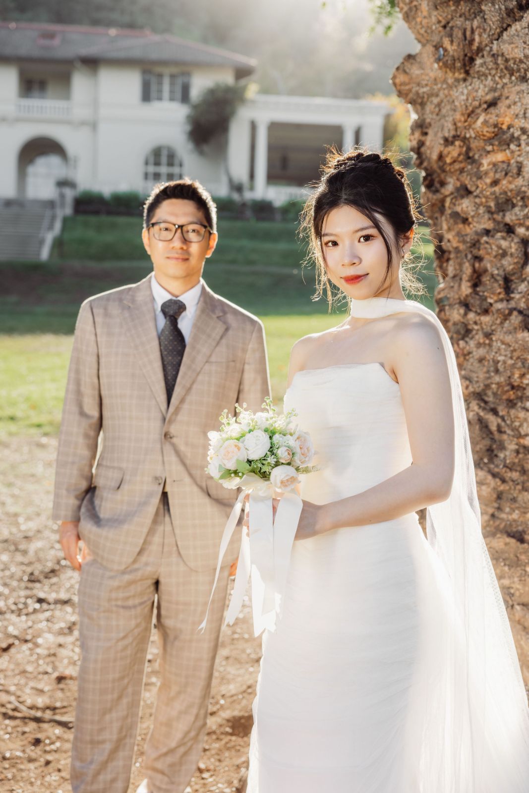 Couple walking hand in hand through the villa gardens at Montalvo Arts Center by SlowMo Studio