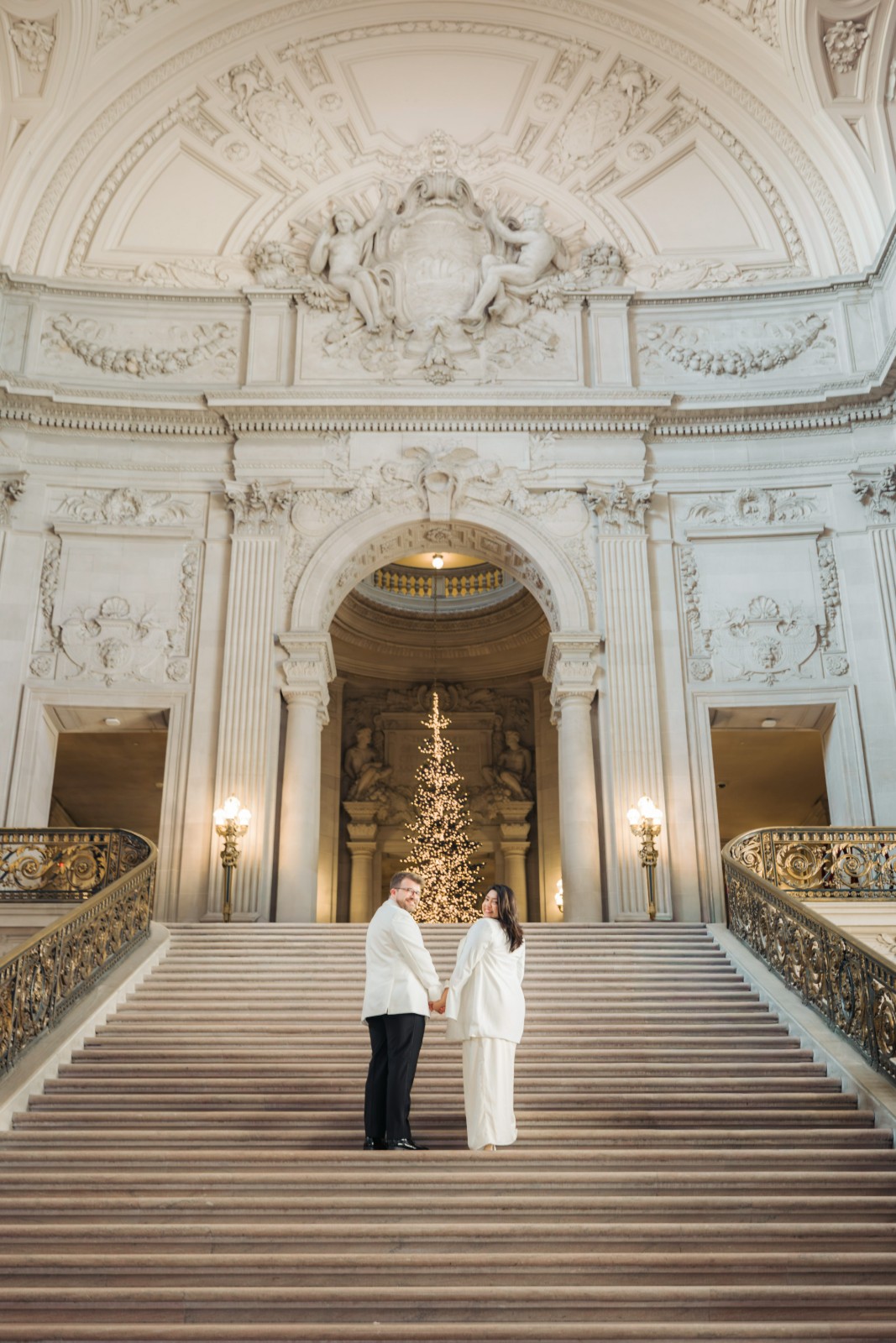 Couple portrait with dramatic Palace of Fine Arts dome in San Francisco by SlowMo Studio