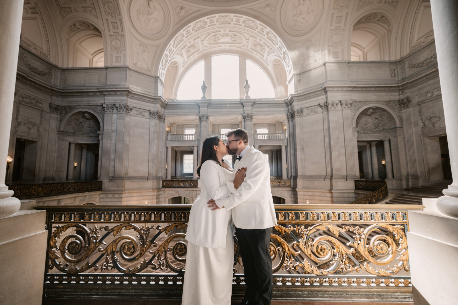 Wedding couple sharing a tender moment at San Francisco City Hall by SlowMo Studio