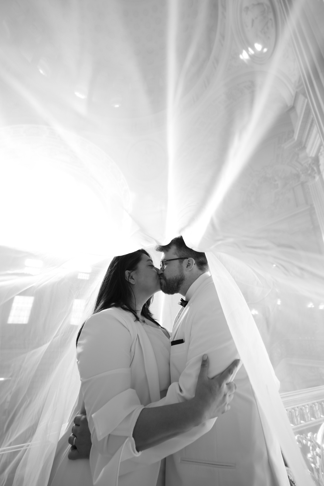 Elegant couple portrait with Palace of Fine Arts columns in San Francisco by SlowMo Studio