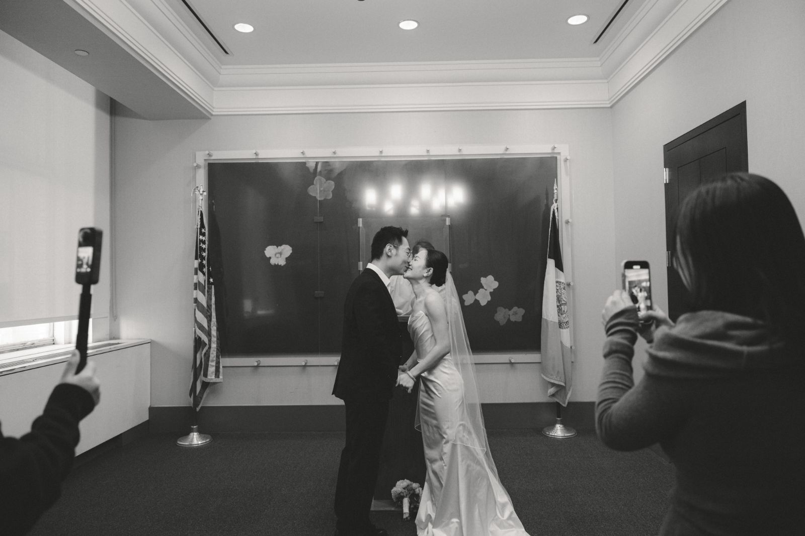 Cinematic engagement portrait of couple in New York City by SlowMo Studio